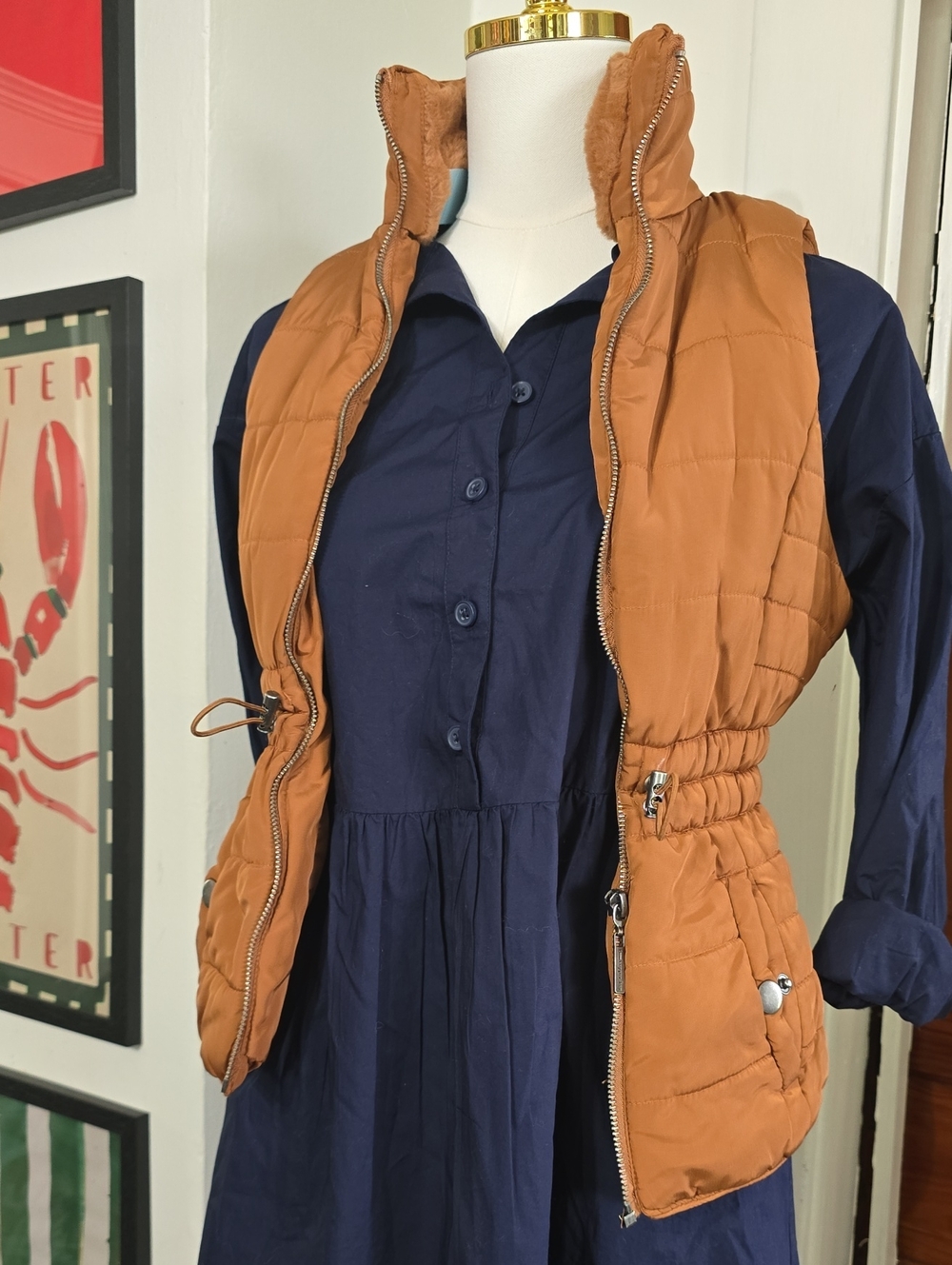 Copper Key Quilted Sleeveless Puffer Vest in Rust Orange